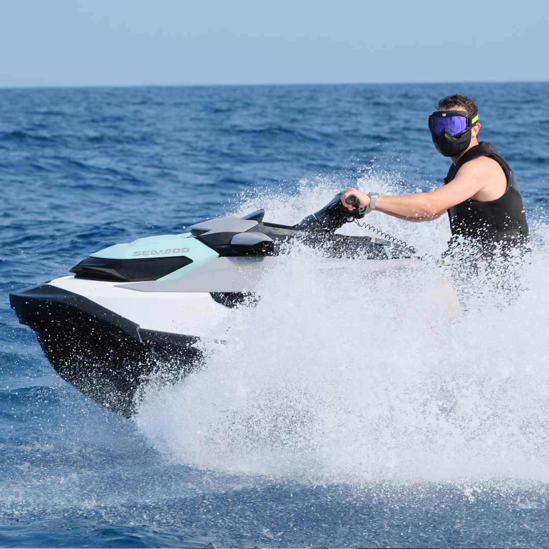 Maskhy Wavy full-face jet ski mask in Black Onyx, worn on a jet ski #color_black onyx